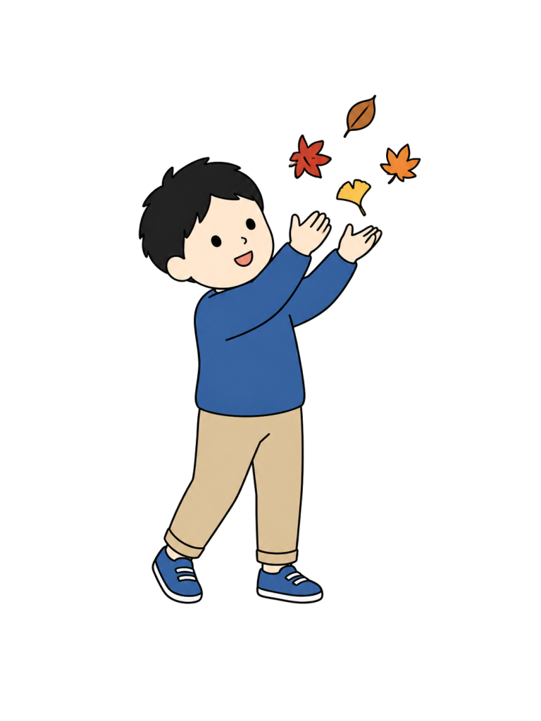 落ち葉で遊ぶ子ども|Child Playing with Fallen Leaves