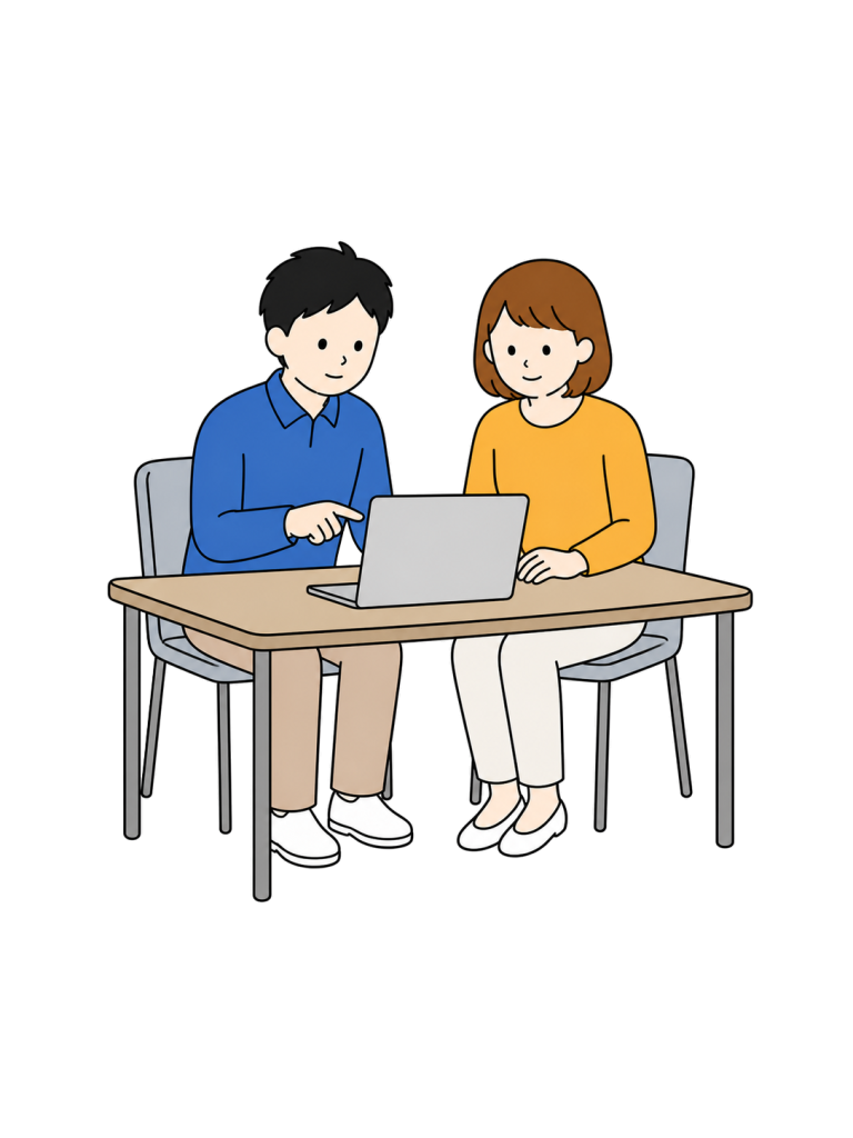 Coworkers reviewing laptop