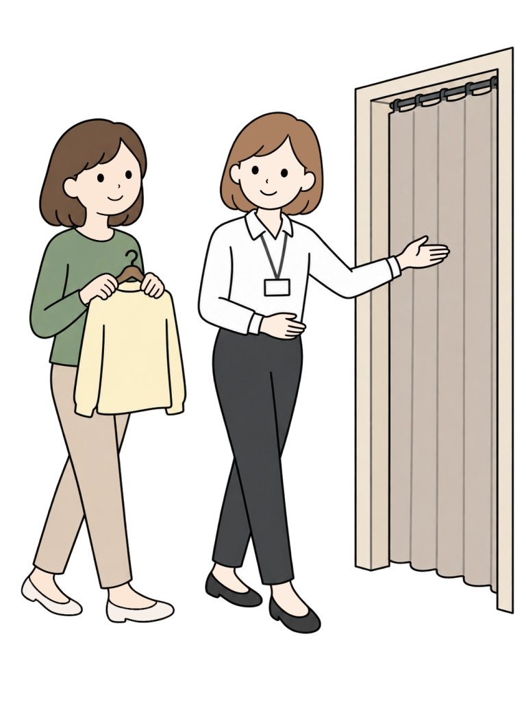 Apparel staff guiding a customer to a fitting room