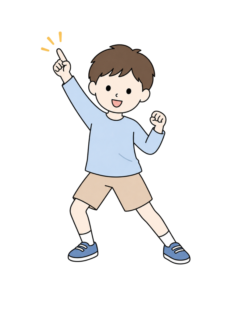 男の子が両腕を上げて元気に踊っている。