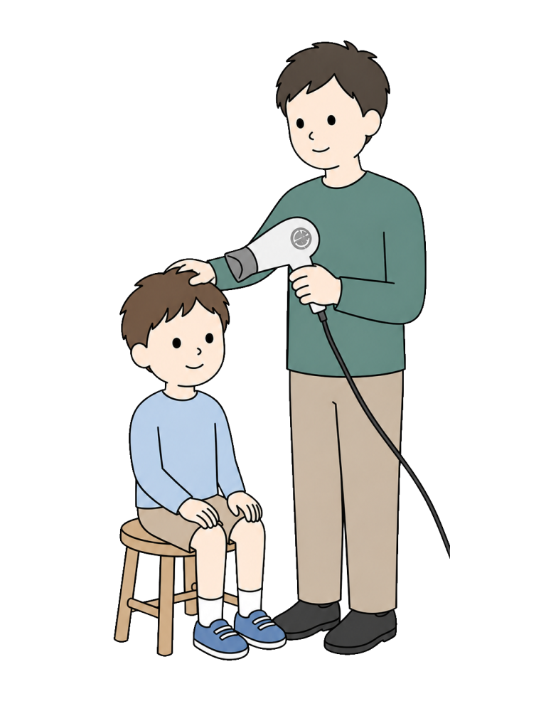 Father drying childs hair