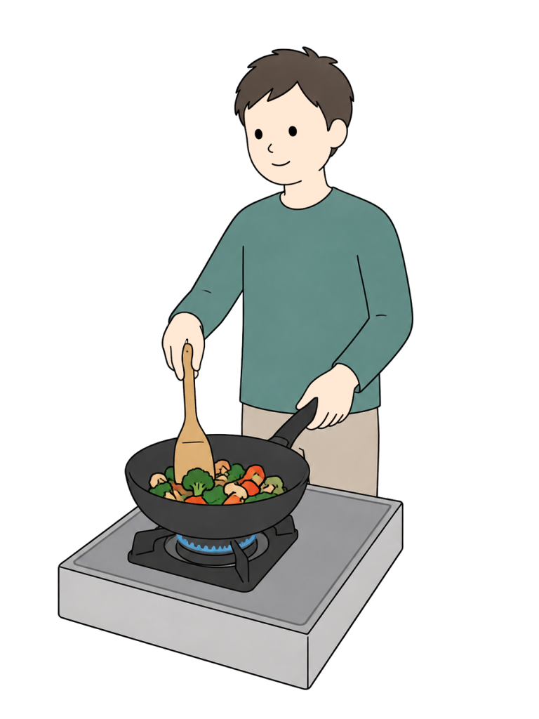Man cooking with a frying pan