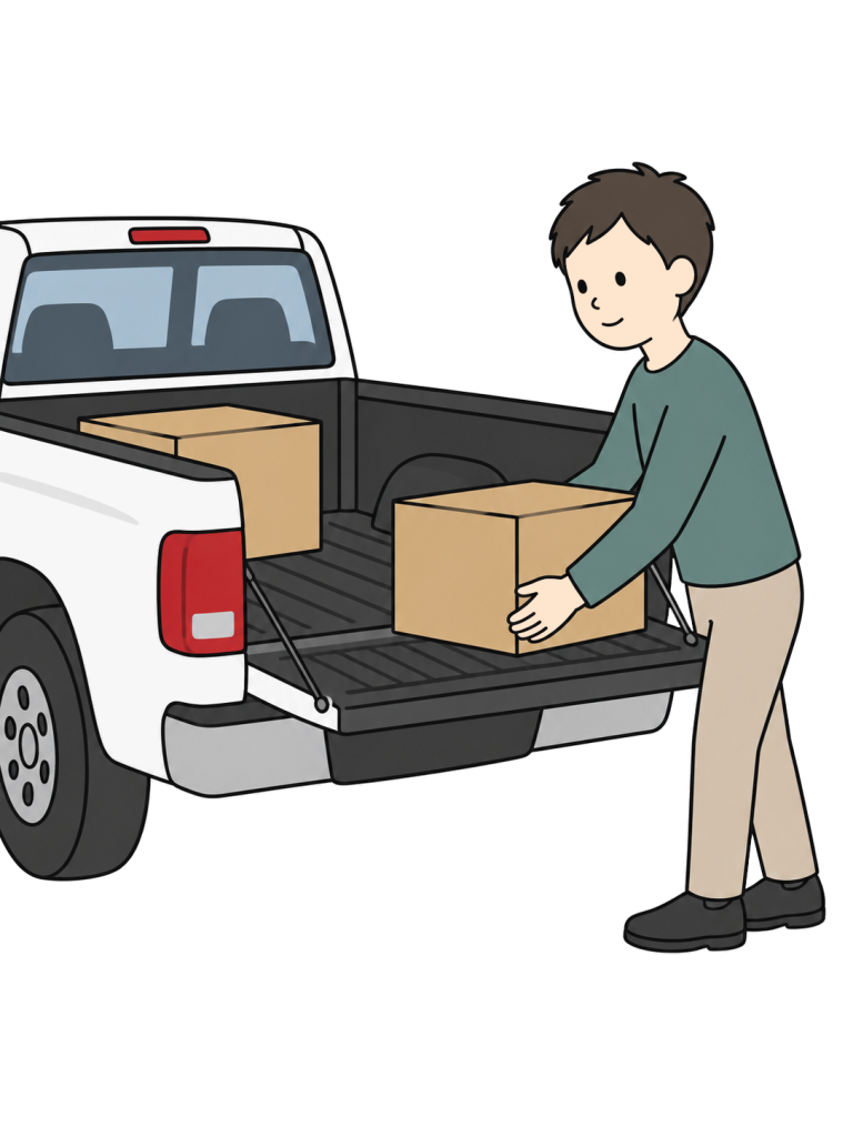 Person loading cargo into a pickup truck