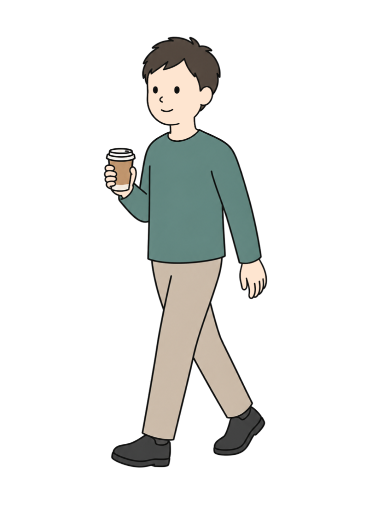 Person walking with takeout coffee