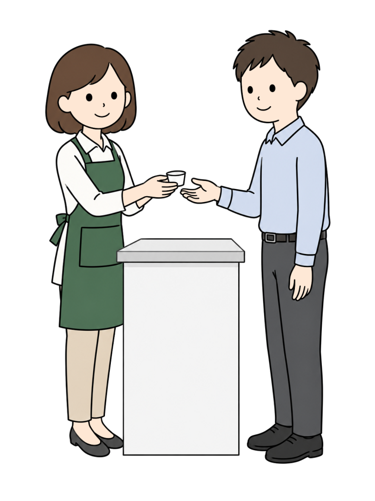 Staff member offering a product sample to a customer
