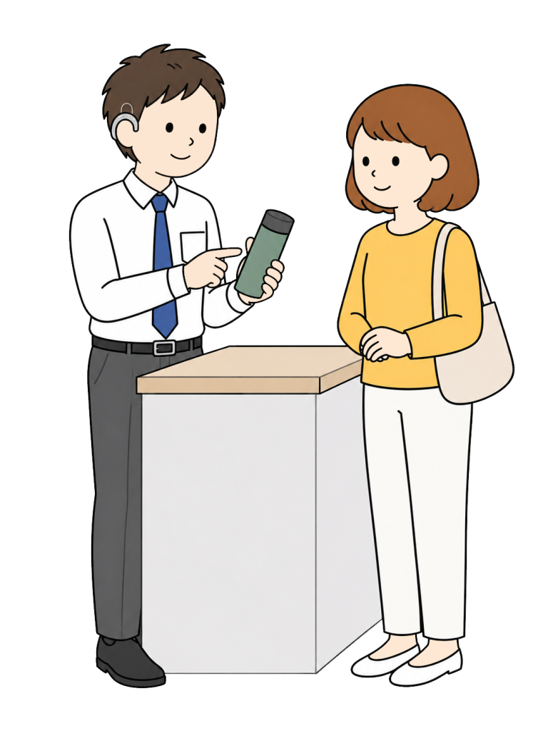 Staff member with a hearing aid serving a customer