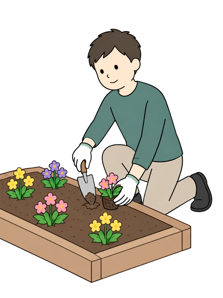 Volunteer planting flowers in a community flower bed