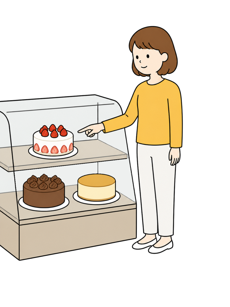 Woman choosing cake at cake shop