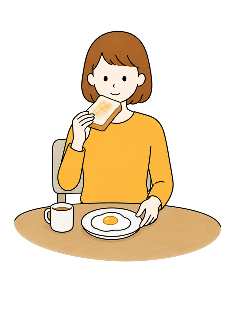 Woman eating toast and eggs for breakfast