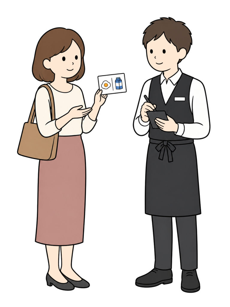 A woman customer shows a card with egg and milk pictograms while a male restaurant employee listens and takes notes.