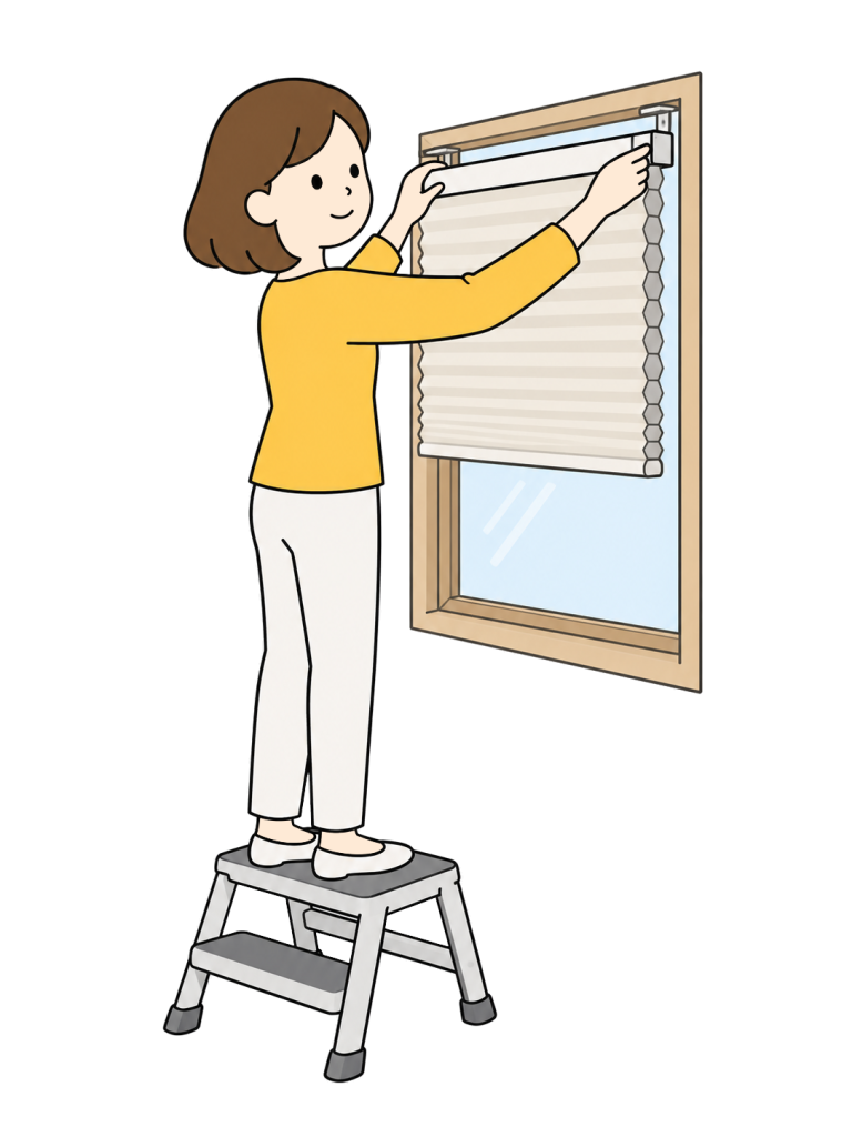 Person installing an insulating honeycomb shade