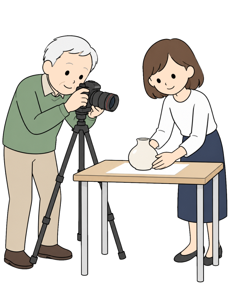 Senior taking product photos with a younger colleague
